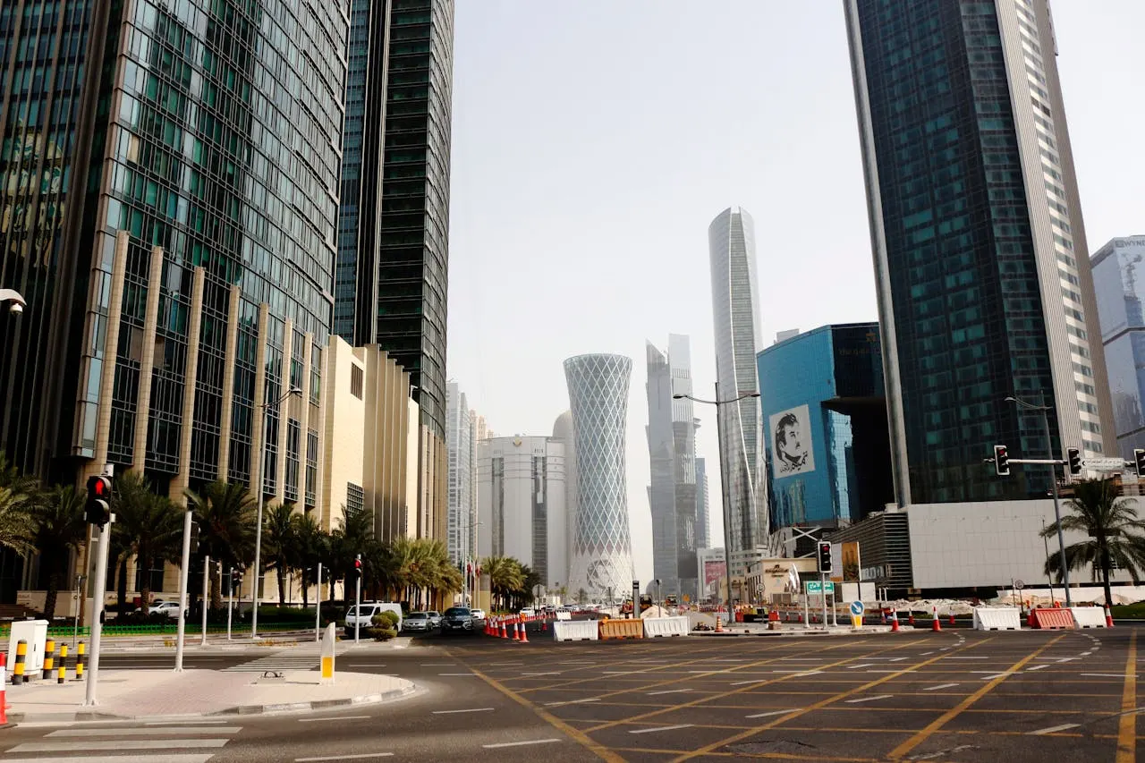 Doha business district street with high-rise buildings